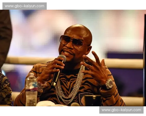 矛与盾的终极博弈：当“铁人”泰森遇见“金钱”梅威瑟，谁才是拳坛真正的GOAT？